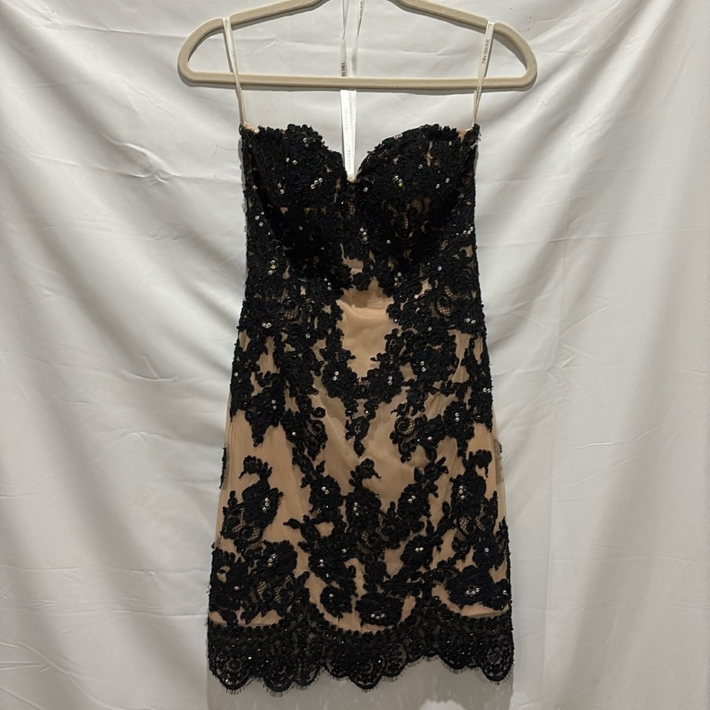 Beautiful nude and black Sherri Hill for prom or any dress up event